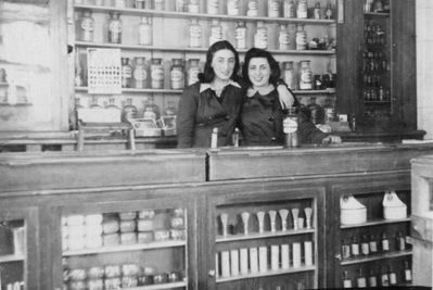 Levin pharmacy and cosmetics shop in Tartu - 1941
The pharmacy at Raekoja plats in Tartu in 1941 after it was nationalized by Soviets. The owner Abram Levin was interrogated by NKVD several times and probably beaten. When Abram escaped from NKVD, he prefered to stay in Tartu with Germans rather than be with Soviets...  (J. Kaplan)
On the picture Mali Gordon (left) and Lea Eidus (Heimann) who worked in the shop. 
