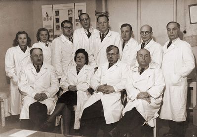 Skin-Venereal diseases clinic in Tallinn - Lai tn. 22
Left to right.
Sitting: Dr Schwarts, ?, Dr Strisch, Dr Poljak
Standing: ?, ?, ?, Dr Dreyer, Dr Uetoa, ?, Dr J. Rubanovitsch, Dr Handschmidt ?
