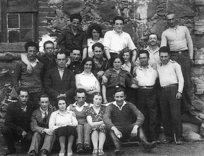 Hachshara in Luunja near Tartu - 1932-33
Left to right.
Bottom row: ?, ?, ?, Folka Dubin, Fanny Harary (Schajevitsch), Rafael Bas
Middle: ?, ?, ?, ?, ?, Lasar (Lazik) Goldberg, Tsilla Vigodski, Sonja Margalit (Muschkat), ?, Berl Verschovski
Top row: ?, Manja Baran, Nechemia (Njuma) Levanon, ?, Reuven Muschkat
