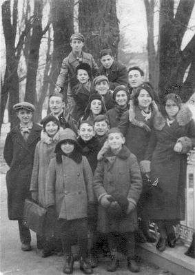 Tartu Hashomer youngsters with "madrichim" ~ 1932
Left to right
5 youngsters in front: ?, Sima Schkop, ?, ?, ?, ?
Next row: ? ?, ?, Rebecca Haitov, ?
Next row: ?, ?, Nechamia Levanon (Levitan)
Top row: ?, Dov Hameiri (Maisel)  
