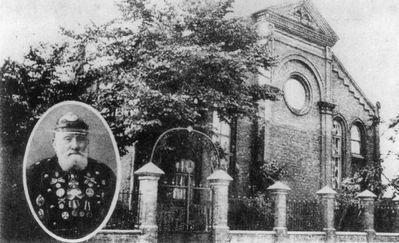 Tartu Great synagogue around 1930
The Great Synagogue at Turu str in Tartu. 
Was built in 1899-1902 and was burned by nazis in 1944. On the left Jacob Aharon Jakobson, one of the oldest and distinguished members of the community. Here in Fireman's uniform (it was a very  honorable voluntary position).
