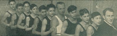 ~1934. 
Right to left: Leopold Markovitsch, Jakob Aronovitsch, Koppel Koslovski, Isak Haitin, instructor Lukin, ?, ?, ?, ?, ?, Izi Goldmann
