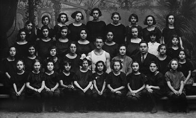 Maccabi 1923
Left to right.
Bottom row: Sally Katsev, Paula Lerenman, Basja Baskin?, Minna Sitt, ?, Berta Raichman, Lena Baskin?, Riva Zigelman, Dina Citron, Julja Gorbar?
Second row from bottom: Anzi Hoff, Reisi Tamarkin or Rosa Prensky, Anna Feinstein, Margarete (Grete) Elian, Utechin, Tsila Friedman?, Dr Rafael Jakobson, Sara Buras, Mira Pessin?
Second row from thr top: Lina Gleser?, ?, ?, Agi Kellert,  ?, Dolly Schulklepper, Mletschin, Ester Frank
Top row: ?, ?, Nessil Kaplan?, Gita Gutman, Ljala Pakkin, Meta Frank?, Sara Teitelbaum, Sara Haitov, Rosa Raichman
