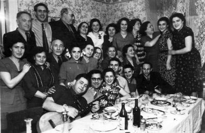 1962 - Ljeva and Sofa Zak wedding
Left to right.
Sitting: Mischa Janovski (with guitar), Hirsch Scherman, Gaja Scherman, Herz Lutrin, ?, Njema Mihailovski
Middle row: ?, ?, Ljeva Nachumov, ?, Sonja Nachumov (Prensky), Sonja Scherman, Gutti Zak (Scherman)?,  Ljuba Janovski
Top row: ?, Ljeva Zak, ?, Sofa Zak (Epstein), ?, ?, ?, ?, ?, ?, ?
