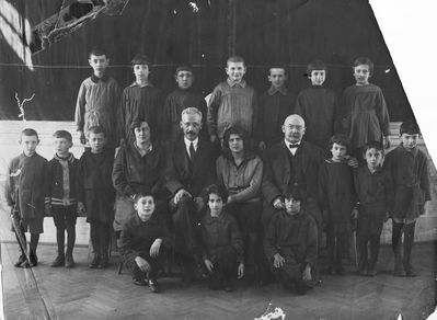 Tallinn - 1926. Jewish Gymnasium - I class in Hebrew - 1926
Left to right.
Teachers: Rabinovitsch from Palestine who came to teach Hebrew,  Samuel Gurin the director, Anna Feinstein - music teacher, Sauerbrei
