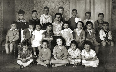 Tallinn - 1937. Jewish Hebrew Kindergarten "Tarbut" in Tallinn - 1937
Mirjam Schampal (Schulklepper) with children.
Left to right.
Top row: Faivi Freidin, Leva Zak, Leo ?, Josif Rybak, Boris Goldberg, ?, Benjomin Mihailovski
Middle row: ?, ?, Feige Schenkman, ?, Mirjam Schulklepper, ?, Judith Rubinstein,  Scheine Shenkman, Rafael Rusinov
Bottom row: ?,  Taubi Mazkin, Sara Vasser, ?, ?
