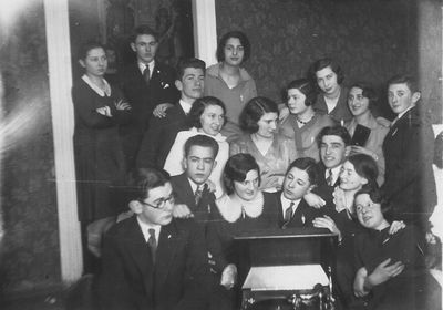 Tallinn - 1930. gathering by Anna Migdal
Left to right.
Standing at left (4):  Basja Danzig, Wulf Gerschanovitsc, Viktor Klompus, Anna Stein (Migdal)
Standing at middle (6): Anna Klas (Gurevitsch), Fanny Jakobson, Riva Itzoch, Fanny Raichmann, Yamima Rom (Gurevitsch), Isai Levin
Sitting at bottom: Abram Danzig, David Gerschanovitsch, Emma Jakobson, Osja Itzoch, Gurevitsch, Bluma Rubanovitsch (Gabovitsch), Hansi (Anna) Hof
