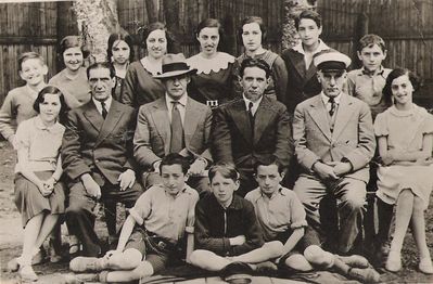 Tartu Jewish school
Left to right.
Top: Mischa Tuvia, Hanna Gens, Pessi Mendelev, Riva Vagenheim, Riva Drui, Ljuba Schenkman (Zak), ?, Haim Resnik
Middle row: Hanna Aronovitsch (Eidelkind), Ezriel Schaput, ?, David Solomon (school director),  Leib Levitin, Mulja Spungin, Musja Drui
Bottom: ?, ?, ?  Spungin? Nodel?  
