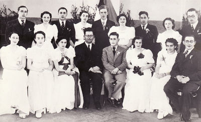 Tallinn - 1938. Jewish gymnasium 1938 graduation
Left to right.
Standing: Fili Brin, Scheina (Genja) Reichman (Koslovski), Hessi Aronovitsch, Dvora (Veevi) Biek, Wulf Lerenmann, Fanny Danziger, Benjamin Kagan, Sima Schkop, Salman Eidus
Sitting: Resi Epstein (Strasch), Bella Press, Jette Rein (Gleser), Estonian teacher Velder, Abram Gutkovitsch, Hanna Goldberg, Jetti Hirschmann, Natan Asnovitsch 
