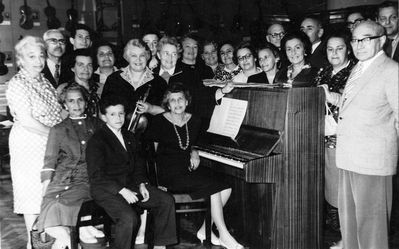 Anna Feinstein and Raja Drabkin (Feinstein) give concert  in the Theater and Music Museum in Tallinn - ~1962
Anna Feinstein (from Israel) and Raja Drabkin (Feinstein, from Moscow) give concert to friends in the Theater and Music Museum in Tallinn - ~1962
Left to right.
Standing: Rebecca Stark (Rubanovitsch), Nosson Gens, Ljuba Pessin, Boris Meyler, Frieda Pessin, Raja Drabkin (Feinstein), Grischa Rubanovitsch, Bluma Rubanovitsch (Gabovitsch), Ida Schapiro (Usvanski), Miriam Usvanski (Gabovitsch),  Rosa? Dobruschkes, Irene Fallstein (Klas), Mira Pessin,  Jakov Gabovitsch,  Reni Klas (Citron),  Aron Tamarkin,  Ruth Rybak (Goldmann), Mark Rybak, Jascha Rubanovitsch,  Samuil Rybak 
Sitting:  Riva Vigodski, Eduard Klas, Anna (Baby) Feinstein 
