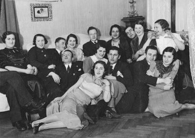 Danzig (Itskovitsch) Berta birthday - 23/2/1934
Left to right.
Top row: Sara Bujanover (Citron), ?, Leo Ginovker,  Lidia Sapir (Vigderhaus, b. Markovitsch), Jakob Vigderhaus,  Anna Stein (Migdal), Isi Itskovitsch, Raja Bam (Koslovski), ?
Middle row: ?, Berta Danzig (Itskovitsch), David Bakscht, Max Boruhov, Gina Besprozvanie (Slutski)
In front: Ljuba Schein (Citron)
