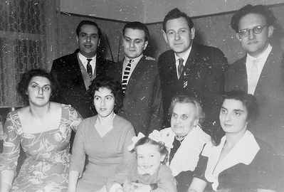 Levins etc
Left to right.
Sitting: Ruth Migdal (Levin), Lia Epstein, Tsilla Auguston, Perle Esse Levin (Sack), Doris Raskin (Levin)
Standing: Sima Levin, Aleksandr Levin, Isai Auguston, Isai Rosenfeld
