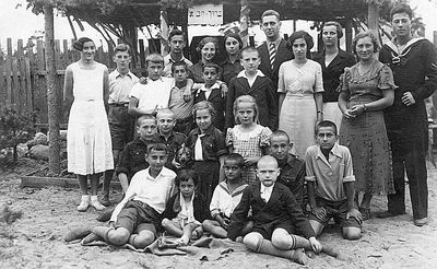 1/7/1934 Tallinn - Bar Mizva of Izhak Itzoch
Left to right.
Top: Yanzi Gleser, Epstein, ?, Isak Haitov, Riva Itzoch, ?, Dora Itzoch (Haitov), Asher (Osja) Itzoch
Middle row: Esja Passov, Rudi Berkovitsch?, ?, Jacov Vseviov, ?, Beilinson
II from bottom: Gordon, ?, Ester Lerenmann (in Beitar dress), ?, ?, Izhak (Isja) Vseviov
Bottom row: Izhak Itzoch (bar-mizva boy), Sara Aronovski (Frank), Israel Vseviov, Beilinson
