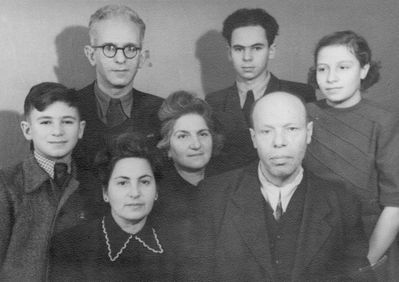 Judeikin family ~1948
Left to right.
On top: Solomon Judeikin, Lev Judeikin, Keili Haitov
Jossi Judeikin, Musja Schats, Abram Haitov
At bottom: Rosa Judeikin (Glickman)  
