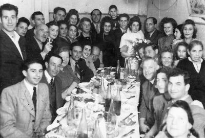 Adik Karol and Riva Tsivan wedding - 21.8.1947
Left to right.
Sitting around the table: Viktor Teitelbaum from Tartu, Turetski, Haje Teitelbaum (Schames) from Valga, Ilja Dubin, Sonja Dubin, Elja Hazke Karol, ?, ?, ?, Riva Zimbalov (Spungin), Alter Zimbalov, First wife of Turetski

Standing: Viktor Teitelbaum from Valga, Minna Abramovitsch, with glass Gordon, Jossi Stein, Golda Stein, Rachel Karol (Zivian), Rachel Zivan (Sigelevitsch), ?, Frieda Feiman (Teitelbaum) - above, wife of Gordon (below), mother of Adik Karol, ?, Malka (Karol), Isak Beilinson (boy), Adik Karol, Riva Karol (Tsivan), ?, Zhenja Fainmann (Teitelbaum), Ester Abramovitsch - girl above, Ranja Manoim (Blum) - girl below, Sara Blum (Zivjan) - above Ranja, ?, Hana-Rischa Beilinson (Novik)  

Keywords: [T] [Z] [A] [B]