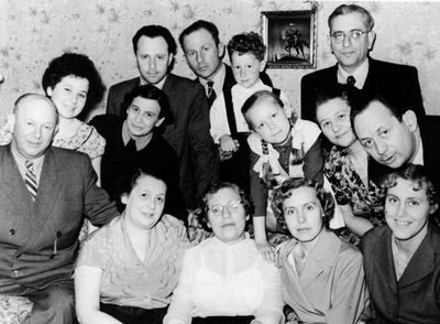 Kaplan, Lapidus
Left to right.
Sitting: Misha Kaplan, Lina Goldberg (Scher), Gitta Kaplan (Bakscht), Valentina Kaplan, Anna Jurismaa
II row: Marina Lapidus, Sonya Scher, Marina Kaplan, Zilla Lapidus, Samuil Kaplan
Top row: Alik Kaplan, Jacov Kaplan, Ilja Lapidus, Jossef Goldberg 
Keywords: [L]