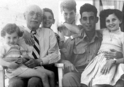 Leib Levitin with his grandchildren during Israeli visit in 1957
Left to right.
Sharona (Jasha Levitan's daughter), Leib Levitin, Benjamin, Arnon, Menachem (all Abrasha Levitan's sons), Dina (Jasha's daughter)
