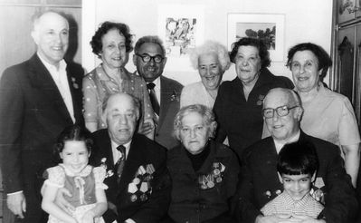 Victory day,  Tallinn 
Left to right.
Standing: Hirsch Kitt, Hesse Kitt (Pozaisky), Juli Klugman, Riva Klugman (Kantor), Minna Gitelson (Kitt), Golda Kitt
Sitting: Benjamin (Haim) Kitt with Anna Pozaisky, Dina Kitt (Citron), Benjamin Gitelson with Samuel Kaplan 
