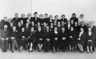 Tallinn - 1938. Parents and teachers committees of the Tallinn Jewish Gymnasium in 1938/9
Left to right.
Top row: Motel Zitomirski, Sonja (Sara) Scherman (Strasch), Gute Sack (Scherman), ?, Ida Sack (Scherman), ? 
Middle row: ?, ?, ?, Ida Zak (Scherman), ?, ?, Isak Bachmat, ?, ?, Basja Meiertal (Schneberg), ?, ?, ?, ?, ?, ?, ?, ?, Schifre Rubinstein (Zak)?, Schmarja Tamarkin
Bottom row: Josef Gurevitsch, ?, ?, ?, ?, Samuel Gurin, ?, Hirsch Aisenstadt, ?, ?, ?
