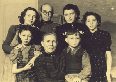 Rubanovitsch - 1946
Left to right.
Bottom row: Karmela Usvanski, Betty Gabovitsch (Lövenstein), Michail Rubanovitsch
Top row: Bluma Rubanovitsch (Gabovitsch), Jascha Rubanovitsch, Miriam Usvanski (Gabovitsch), Hani Zautin (Usvanski)
Behind Jascha - curtained portrait of J. Stalin - just in case...
