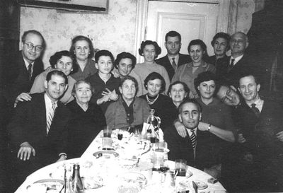 1960 - Farewell party to Gitta Heimann (1960 emigrating to Israel)
Left to right:
Standing: Zalman Eidus, Reni Schames, Miriam Tamarkin, Arik Eidus, Lea Balonov (Heimann), Riva Koslovski (Zivjan), Boris Smolenski, Lea Eidus (Heimann), Etti Paturski, Herman Zivjan
Sitting: Jacob Koslovski, Rasse Furmanski (Heimann), Gitta Heimann, Rasse Paturski, Fanni Smolenski (Heimann), Aron Tamarkin, Etti Majofes (Schein), Avram Paturski, Teffi Majofes  
Keywords: [P] [E] [K] [B] [Z] [M] [com1960]