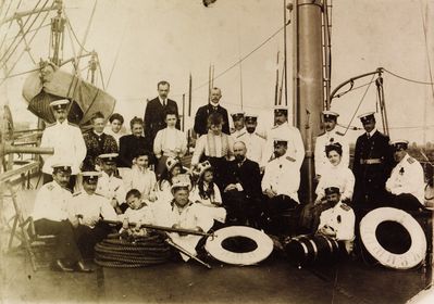 1911 - Nikolai II on board of his yacht "Almaz"
The cruiser "Almaz" was build in Peterburg in 1902.  Participated in the Japanese war of 1905.
Between 7/10/1908 and 23/7/1911 was used as the yacht of the tsar Nikolai II.
The III from the right in the middle row is Nikolai II. 
His ill child sits in the front. Left from Nicolai II is P. A. Stolypin.
In the top row IVth from right is Shalom Reuven Itzoch (the son of the kantonist Avraham Izhak Itzoch from Estonia). Shalom Reuven was baptised and got the name Aleksandr Aleksandrovitch Aleksandrov. He served as the fleet officer in the Russian navy. Born 1872, died 1914
