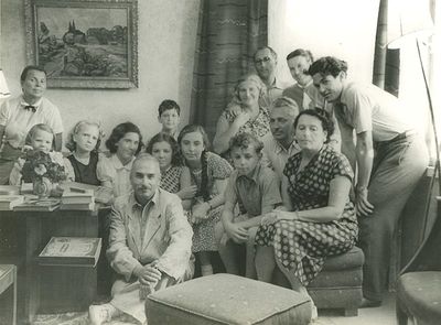 By Haitovs. 1958 
Sitting in foreground: Aleksander ("Kika") Blumberg.
Sitting from right: Musja Haitov (Gutman), Isak Haitov, Daniel Hopp, ?
Standing from right: ?, ?, Schmuel Haitov, ?
