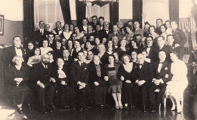 Wedding of Eduard and Anna Klas-Glass. 3.6.1934. Tallinn
Left to right. Sitting first row: Tsila-Feiga Tamarkin (Klas), Jossef Gurevitsch, Esther Gurevitsch (Goz), Eduard Klas-Glass, ?, Anna Klas-Glass (Gurevitsch), Stanislava Klas-Glass (Fruchtmann), Herman Klas-Glass, ?, ?
Second row: Selma Slonim (Tamarkin), ?, Ber Goldmann, ?, ?, Rebekka Feinstein (Lopatnikov), ?, ?, ?
Third row: ?, ?, Ester (Fira) Hanson (Klas), Raja Drabkin (Feinstein), ??????, Benno Markovitsch, Isidor Goldmann
Fourth row: ?, ?, ?, ?, ?, ?, ?, ?, Mark Kolovsky, ?, Aron Feinstein
Top row: ?, ?, ?, ?, ?, ?, ?, Maks Feinstein, ?, ?, Herman Meiertal, , ?, ?, Ruth Rybak (Klas-Glass, nee Goldmann), Anna (Baby) Feinstein, ?, ?, ?, Grete Elian, ?, Irene Falstein (Klas-Glass), ?, ?
