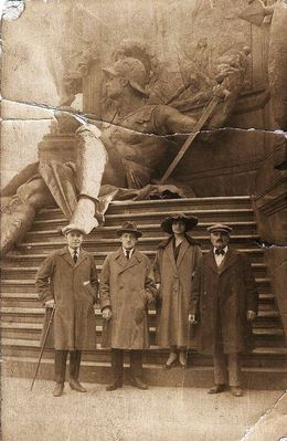 Binmanns and Brodovski in front of Kaiser Wilhelm I National Monument in 1922.
A newly married, Harry Binman stands on far left, his Iowa Uncle Harry Feine on far right. The photo was taken in the fall of 1922 before they returned to United States November 1922. Harry and Rose had been married in Estonia earlier that summer. The young couple between them was Harry Binman’s first cousin Esther Schein (1900 – 1985) and her husband Dr. Moshe Brodovski (1890 – 1937). They had been married in 1921. 
This photo was taken in front of the massive base of the Kaiser Wilhelm I National Monument beside the Kaiser's palace in Berlin. Built in the 1890s, it was destroyed during WW2. The monument, topped by an equestrian statue of the first German Emperor, was built in the 1890s in front of the Berlin City Palace on the Spree River. 
