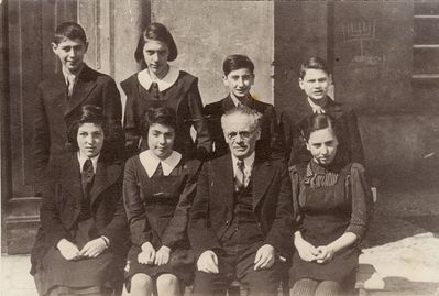 Tallinn - 1938.  Jewish Gymnasium 1938/9
Left to right.
Standing: Rafi Levin, Riva Abramovitsch, ?, Leib ?
Sitting: Haja Belostotski, Dina Levin, Schmarja Tamarkin, Zilla Zivian? 
