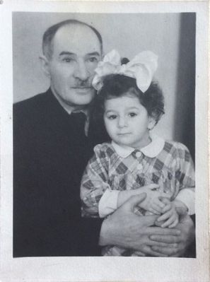 Liberman Moissei with grandchild. 1955.
