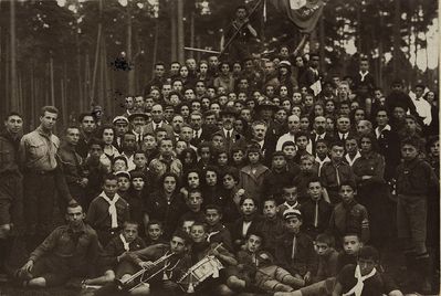 Rabbi Mordechai Nurok posing in the middle of a group of members of the Zionist Scouting "Gedud Tzofim - Bar Kochba" in Tallinn. Estonia, 1925
