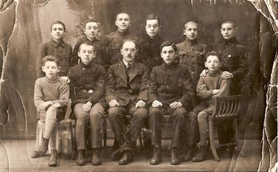 Tartu - 1921. School picture. March 1921.
According to LEA 1617 text - Farewell party to Efraym Epstein (aliya to Palestine). In the middle - Leib Levitin, Levitin sons Abram and Samuil are sitting from both sides. 
