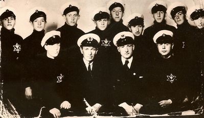 Latvian and Estonian Beitar sailors team from Beitar owned ship "Theodor Herzl". May 1938.
Left to right.
Sitting: Abram Bash, Latvian Captain Rotskol (?), officer Rivlin, Tuvia Smolenski 
Standing: Lachman, Moshe Grinberg, Hirsch Rabinovitsch,  Monya Levin, Haim Zudelman, Rafael Orfang, Monya Lifshits, G. Noiman, Eliezer Zohar (Helman)
