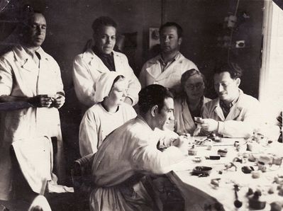 Railway polyclinic 1948
Left to right.
Standing - Benjamin Gitelson (dental technician), ?, ?
Sitting - ?, Jacob Blechman (dental technician), ?, Jakov Pats (dental technician)
