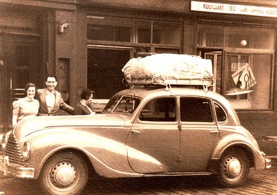 Ilja (Alja) Isrin's "famous" BMW ready to go for a week long camping somewhere in Estonia. 1960.  (I)
Left to right: Olga Kan (Kan), Aleksander Kan, Rut Rybak (Goldmann). Pärnu mnt. 40, Tallinn
