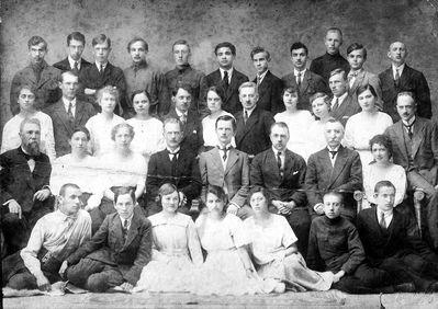 Tartu - 1921. Russian gymnasium 11/6/1921
Left to right (There could be mistakes in the names and their order).
Sitting (teachers): Sildnik, G. J. Michelson, P.P Popov, I.M. Toff, A.A. Bilov, D.M. Shumikov, M.P. Edelgaus, E.E Berent, Ella M. Vilenski
Bottom: M. Kljas, V. Glasov, S. Bleive, M. Slatkin, S. Jakobson, D. Sorkin, M. Judeikin
II row from top: P. Kruskal, N. Kimgevelt, R. Vidik, S. Krastin, I. Restas, L. Mjatschikov, G. Zimbler, M. Kremer, ?, ?, M.V. Jakovlev, A.J. Michelson
Top row: Gansen, J. Flaks, N. Jaropolski, V. Ljapunov, I. Daiber, A. Bass, G. Tschakkar, A. Slatkin, N. Tomger, J. Seisler, E. Kent? 
