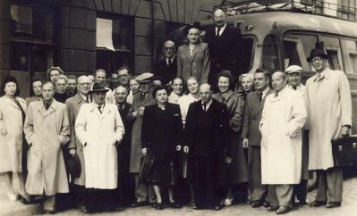 Tallinn Skin and Venereal Diseases Dispensary workers "celebrating" the 1st of May - closeup
in front of the clinic at Lai tn. 22. 
Left to right. At top: Josif Rubanovitsch, ?, Hirsch Schwarts 
Standing: First from right: Harry Dreyer, Third from right: Michael Kolomoitsev. Seventh from left: Max Klompus.
Keywords: [unknown]