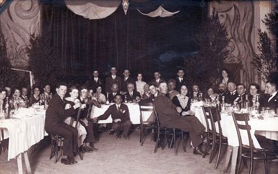 Tallinn - 1930 TJG graduation banquet
In the middle on the wall - 1930 graduation (4th year) badge
