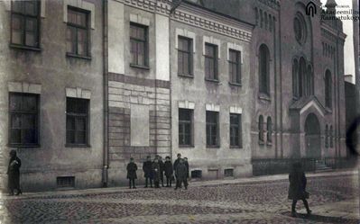 1929. Building adjacent to the Synagogue. 
Administration of the synagogue and the religious community, home of kantor Gurevitsch, heder (school). 
