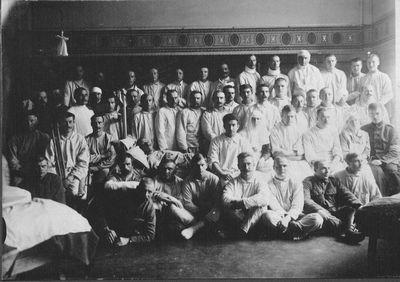 The Hospital of the III Division, bandaging battalion. Valga, 1919  (III Diviisi Sidumise Salga haigemaja)
Sitting: O. Angelus, nurse Hasselblatt, the chief medic Dr F. Kruse, Dr von Stöhr, nurse Vinogradova, medical attendant student S. Kremer (missing medical attendant student S. Kropman).
In front second from right Mottel Jakobson.
