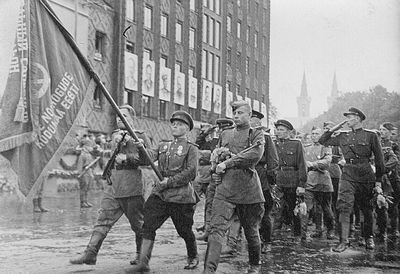 1945 - WWII - Victory parade  in Tallinn.  At far right saluting Shura Kaplan
